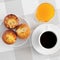 Cup of coffee, muffins and orange juice