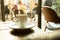 Cup of coffee in a nice hipster cafe. Soft focused image.