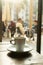 Cup of coffee in a nice hipster cafe. Soft focused image.