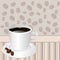 Cup of coffee over striped background