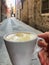 A cup of coffee in the streets of Venice, Italy.