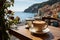 A cup of coffee on a table of outdoor restaurant in small seaside town in Italy. Having breakfast coffee in Italian scenery on