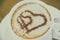 Cup of coffee with two hearts. It s symbol of Love in foam. It's a delicious sweet hot drink