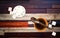 Cup of coffee and white refinery sugar on old wooden table