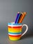 A cup colorful with group pencil all color in gray