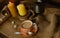 cup with drink coffee on old vintage wooden table, metal coffee maker