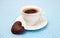 Cup of espresso and chocolate cookie