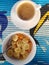 Cup of esspresso and cereal with banana, breakfast set