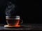 A Cup of freshly brewed black tea,escaping steam,warm soft light, darker background. Created with Generative AI