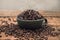 Cup full of Black coffee grains lie on a brown wooden table, background image. Coffee beans in a green cup