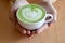 A cup of green tea matcha latte