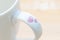 Cup handle with pink heart print