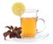 Cup of herbal tea with red tulsi leaves and lemon