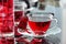 Cup of hibiscus tea rosella, karkade on kitchen table