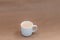 A cup of homemade hot milky coffee with empty space for text. Vivid bright colors