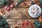 A Cup of hot chocolate with marshmallows. Christmas tree and decorations, cane caramel and oranges nuts Wooden background copy