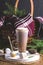 Cup of hot and tasty chocolate with Toasted Marshmallow Vertical Toned Christmas Drink Fir Branches Picnic Basket Blanket