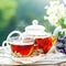 Cup with hot tea with mint and a thyme on a wooden table in a summer garden. Selective focus,