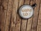 Cup of milk on wood table, with word wake up concept of breakfast