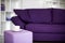 Cup and purple couch