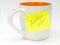 Cup with sticky note