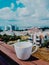 Cup of tea on a blurred background of the city.