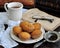 cup of tea, cakes and ancient books