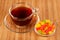 Cup of tea with candied fruits