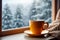 cup of tea or coffee mug on table near window Winter holidays