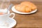 A cup of tea and croissant. Festive breakfast Valentine`s Day.