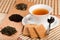 Cup of tea and dried tea leaves