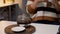 Cup of tea and kettle sitting on kitchen white table