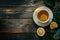 A cup of tea with lemon high angle view on a dark wooden background space for text