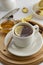 Cup tea with lemon and honey on a white background. Hot tea cup isolated, top view. Autumn, fall or winter drink. Copy space