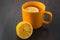 Cup of tea with lemon on table close-up. healthcare, traditional medicine and flu concept - tea cup with lemon.