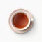 A cup of tea on a saucer on white background