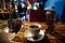 A cup of tea on the table next to the hookah. Atmospheric street cafe