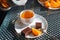 Cup of tea with Wafers in chocolate with biscuits and orange.