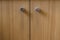 Cupboard doors with round handles with wood veneer finish