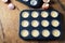 Cupcake butter in metal tray, ready to be bake