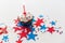 Cupcake with candle and stars at 4th july party