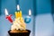 Cupcake with a candles for 2 - second birthday