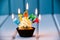 Cupcake with a candles for 8 - eighth birthday