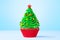 Cupcake. Christmas Tree cupcake with star on top. Red cup liners. Merry Christmas. Tasty baking cupcakes, cake or muffin
