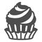 Cupcake with cream frosting, two flavors solid icon, pastry concept, fluffy muffin vector sign on white background