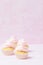 Cupcake decorated with pink buttercream on pastel pink background. Sweet beautiful cake. Vertical banner, greeting card for birthd