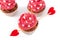 Cupcake decorated with sugar hearts and a cupid arrow for Valentine`s Day isolated