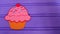 Cupcake icon on a purple background