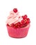 Cupcake with pink cream and red currant
