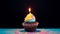 A cupcake with a single candle, typically used as a symbol for a birthday celebration